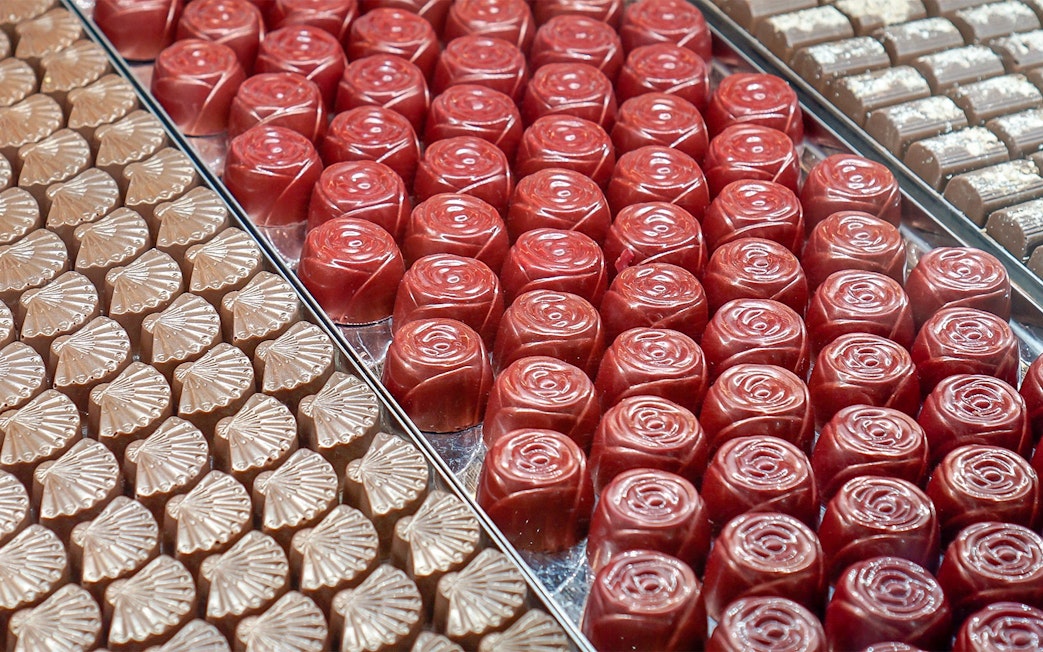 Assorted chocolates displayed at a Yarra Valley winery, featuring rose-shaped and shell designs.