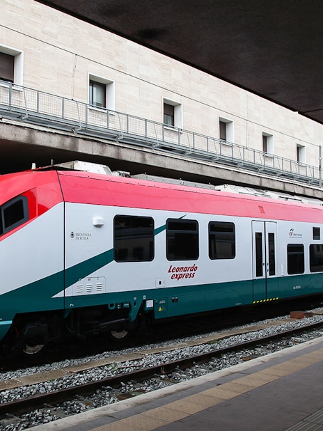 Leonardo Express train at station platform for Fiumicino Airport transfers.