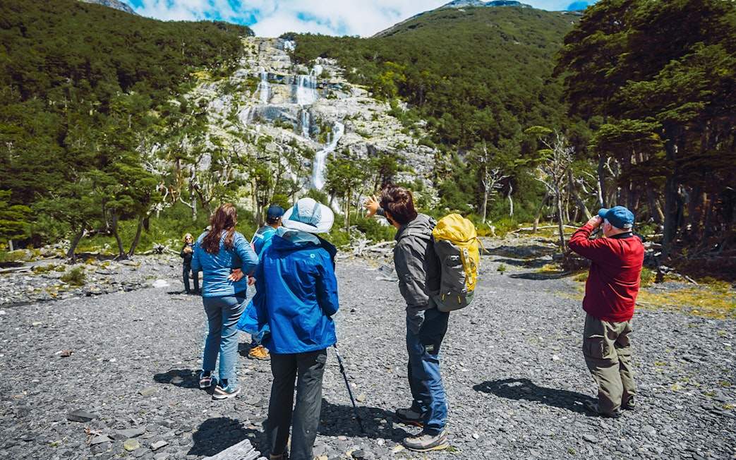 Tourists with guide trekking in Los Glaciares National Park, Patagonia, Argentina.
