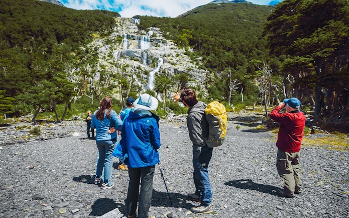 Tourists with guide trekking in Los Glaciares National Park, Patagonia, Argentina.