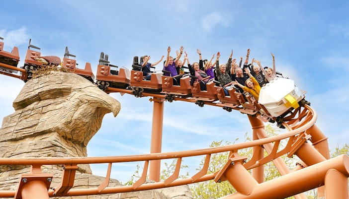 Rollercoaster at LEGOLAND® Billund with riders enjoying the thrill.
