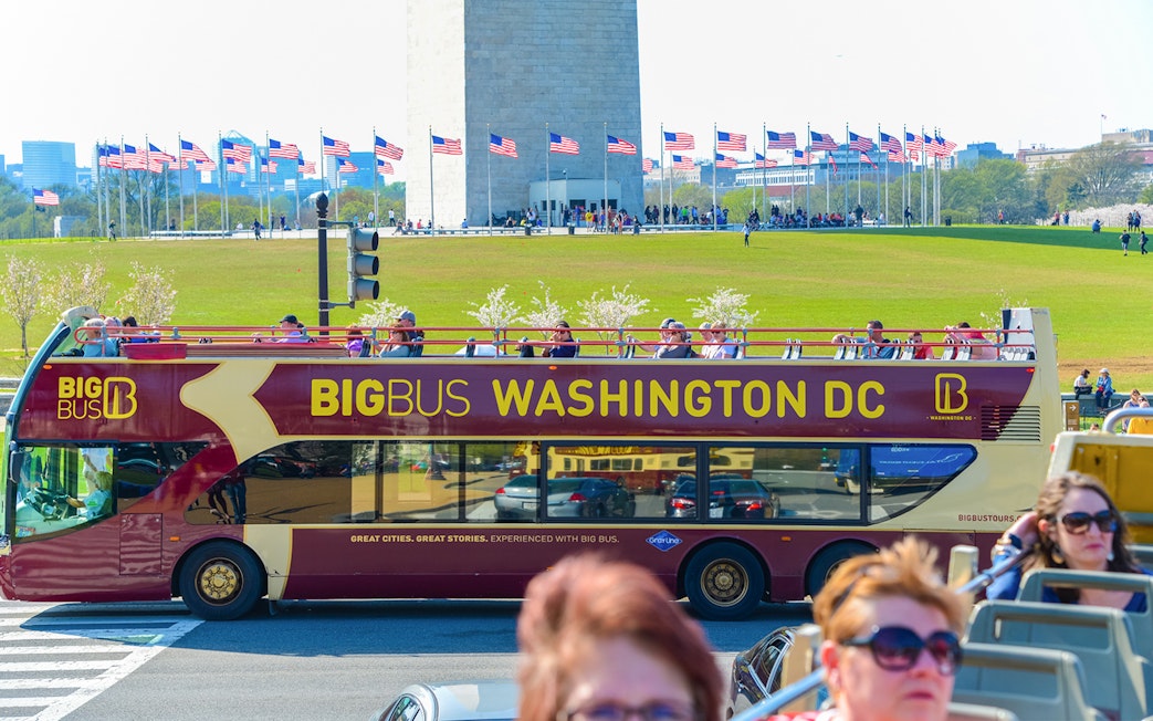 Open-top tour bus near Washington Monument, Washington DC Hop-On-Hop-Off Tour.