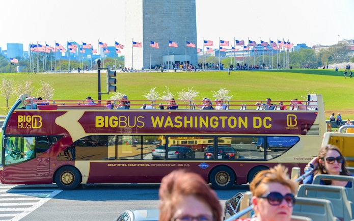 Open-top tour bus near Washington Monument, Washington DC Hop-On-Hop-Off Tour.