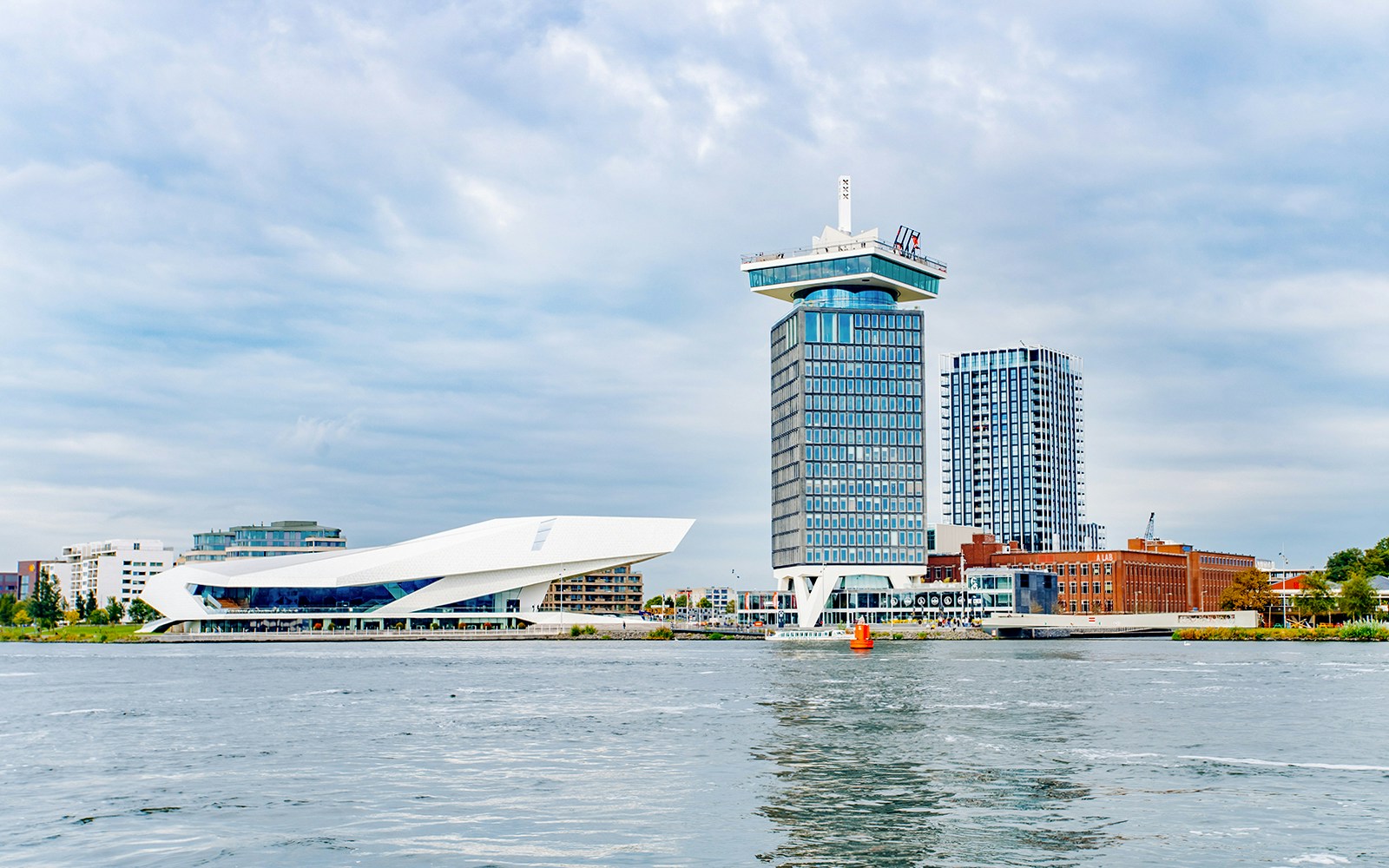 A’dam Tower by IJ River in Amsterdam with panoramic city views.