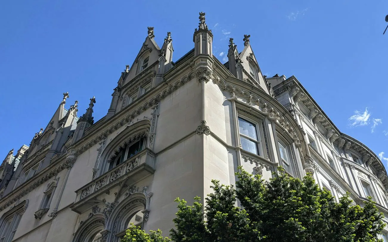 Historic building facade with ornate architecture in New York Central Park area.