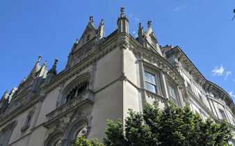 Historic building facade with ornate architecture in New York Central Park area.