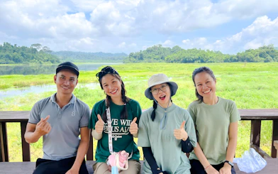 Group enjoying Nam Cat Tien jungle view, part of the Ho Chi Minh City one-day trek and river boating tour.