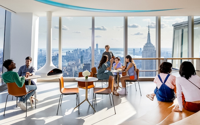 Visitors enjoying the view of New York City from SUMMIT One Vanderbilt observation deck.