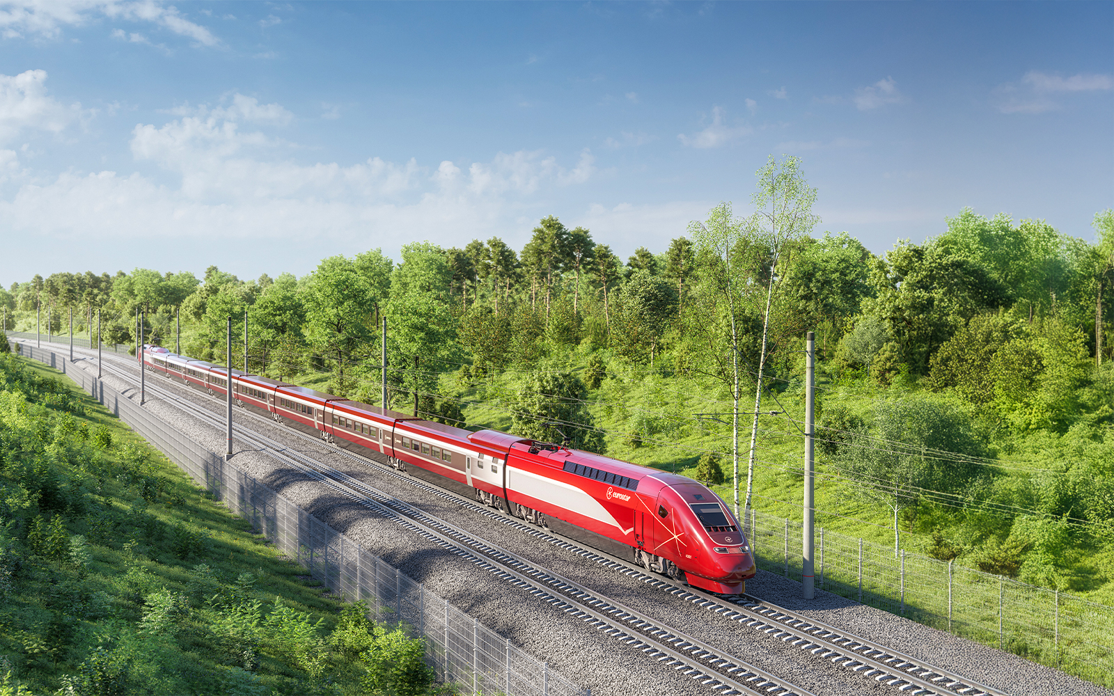Eurostar train traveling through lush green countryside in Europe.