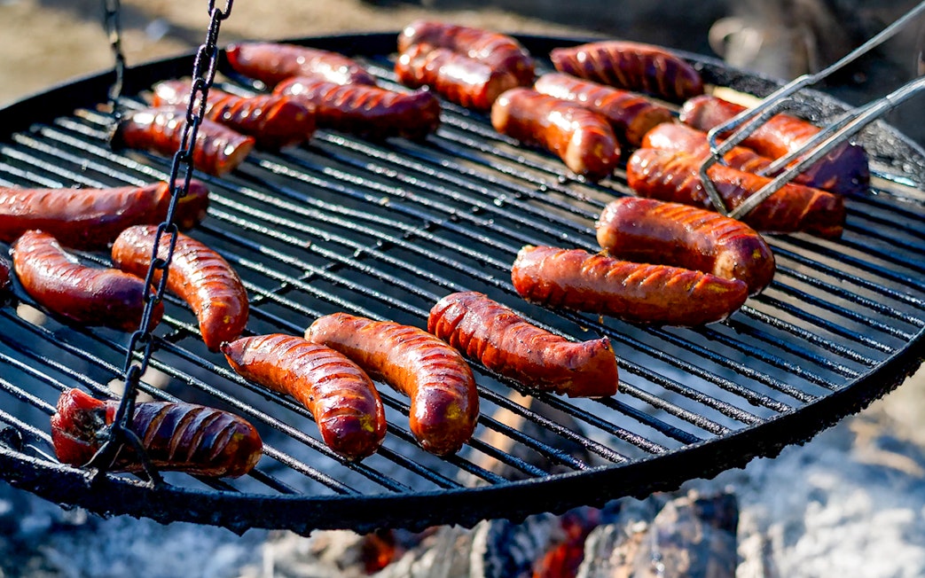 Barbeque sausages grilling during Quad Biking Adventure in Zakopane.