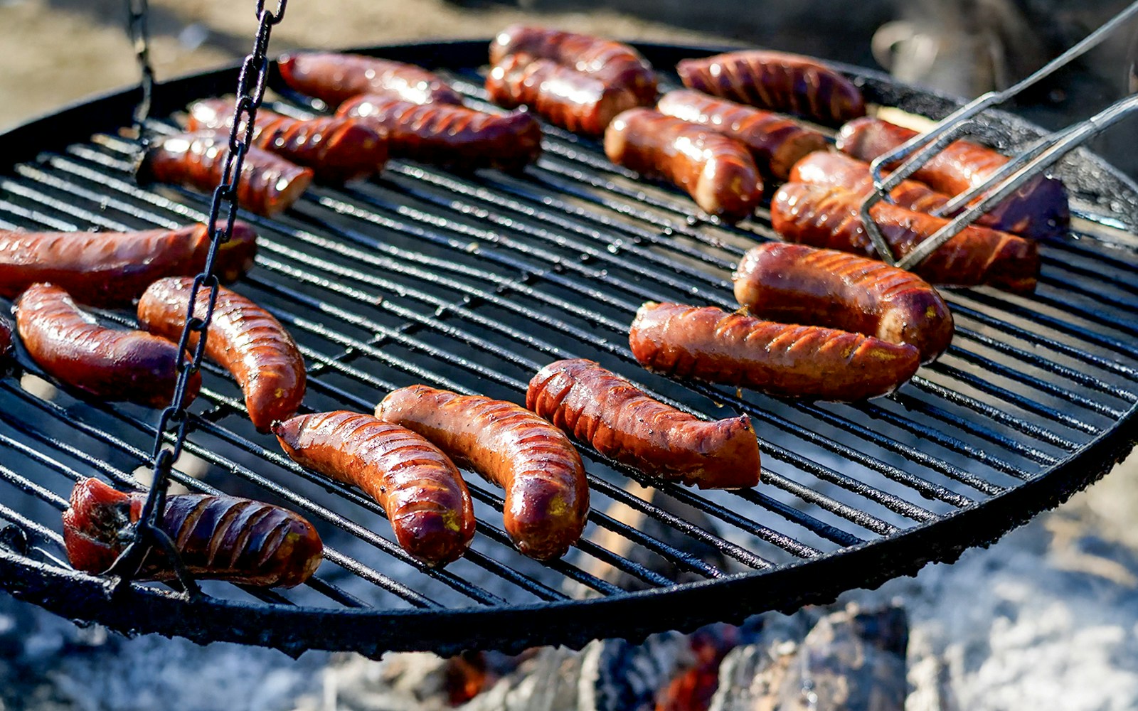 Barbeque sausages grilling during Quad Biking Adventure in Zakopane.
