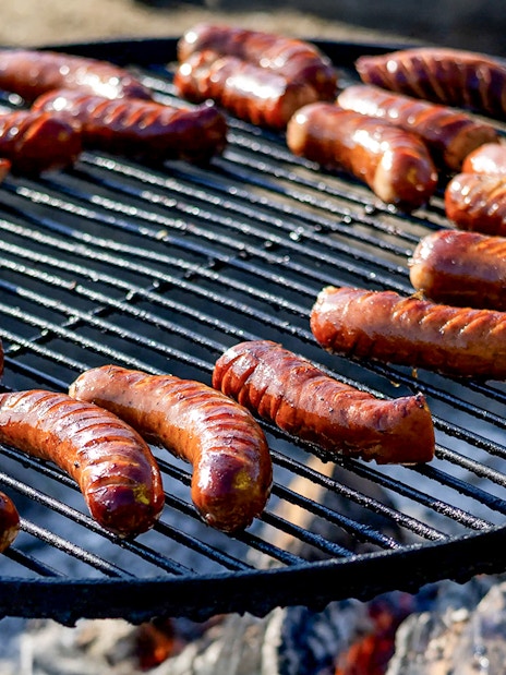 Barbeque sausages grilling during Quad Biking Adventure in Zakopane.