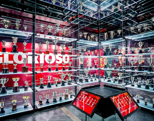 Benfica Stadium museum display of football trophies in Lisbon, Portugal.