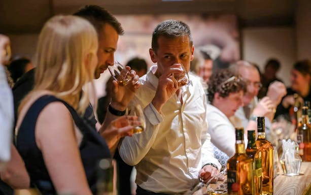Guests tasting whiskey at the Irish Whiskey Museum in Dublin.