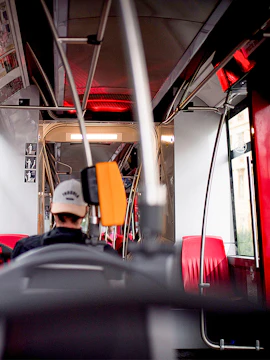 Inside view of a bus with passengers, heading to Avalon Airport.