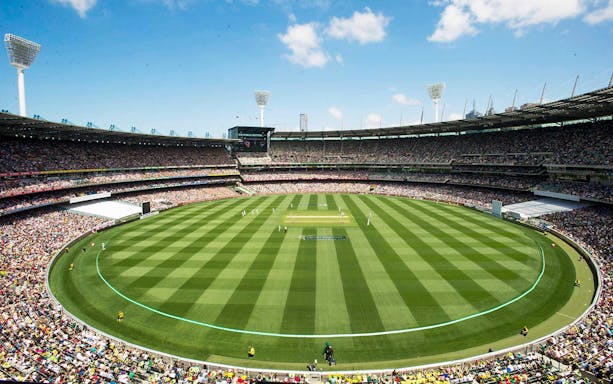 Melbourne Cricket Ground filled with spectators during a cricket match.