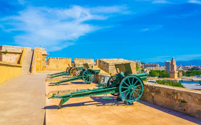 Cannons at Military Museum, Fort San Carlos, Palma de Mallorca, with city view.