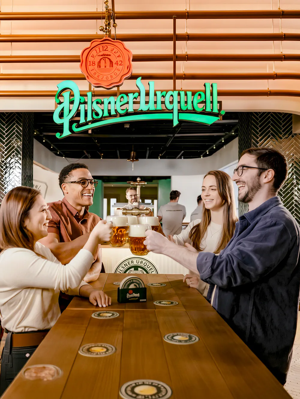 Tourists enjoying beer at Pilsner Urquell The Original Beer Experience.