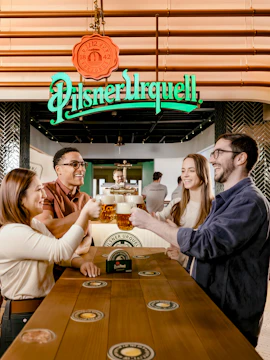 Tourists enjoying beer at Pilsner Urquell The Original Beer Experience.