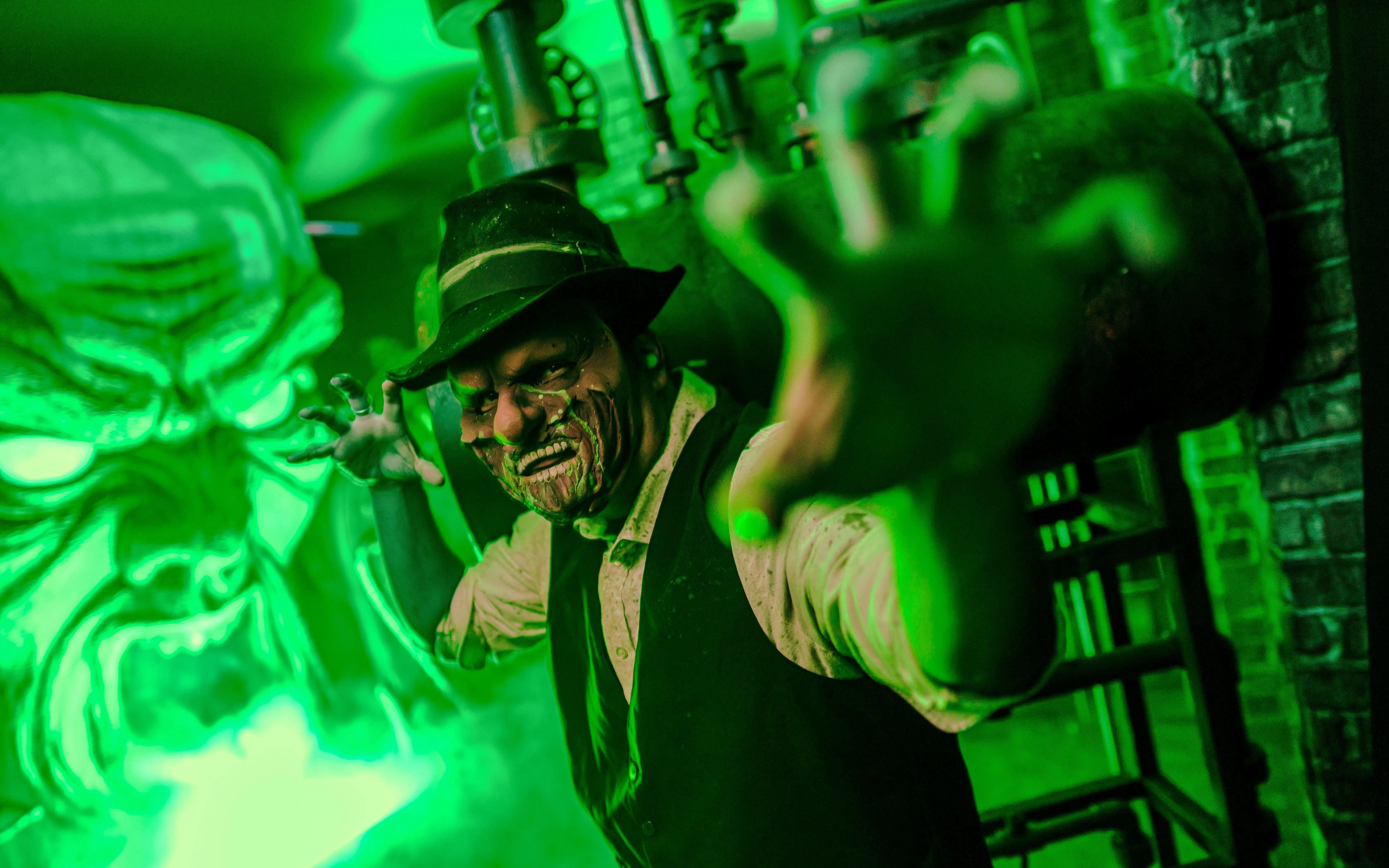 Haunted character reaching out at Knott's Berry Scary Farm, Southern California.