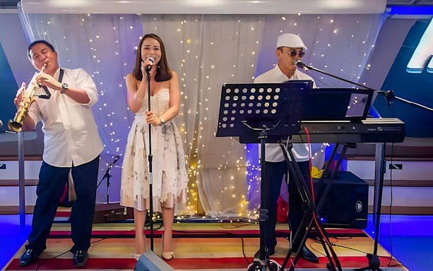 Live band performing on North Borneo Cruises in Kota Kinabalu.