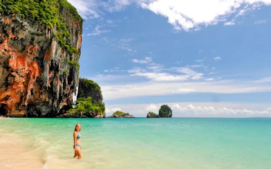 Rock formations and turquoise water at Railay Beach, Krabi, ideal for rock climbing tours.