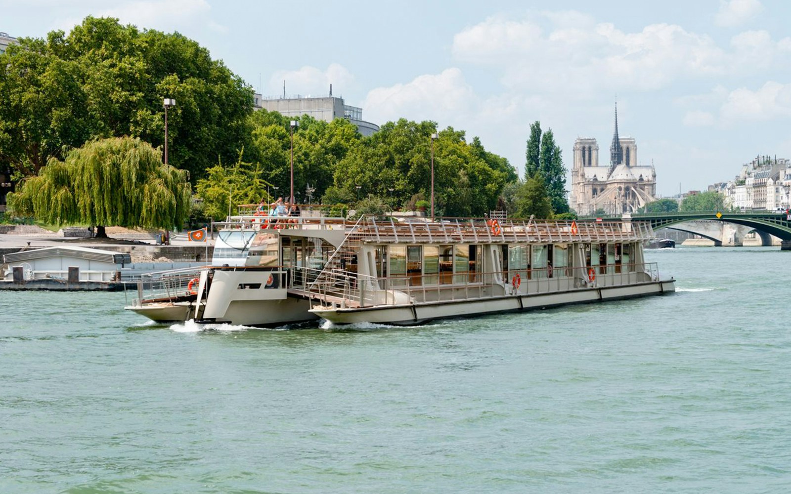 Seine River Cruise with view of Eiffel Tower in Paris, France.