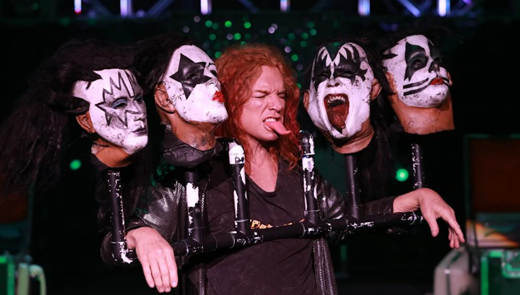 Performer with theatrical masks at Carrot Top show in Las Vegas.