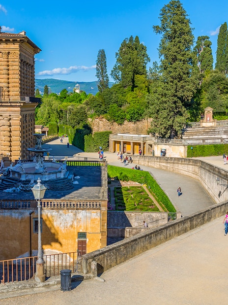 Visitors walking in Boboli Gardens at Pitti Palace, Florence.