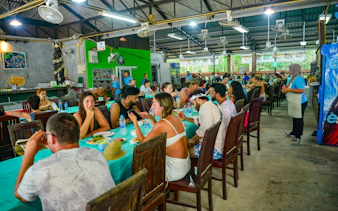 Visitors dining at a local restaurant in Krabi during the Nature Escape tour.