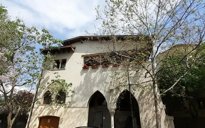 Historic building with arched windows in Bucharest, part of the Spy Game city exploration tour.
