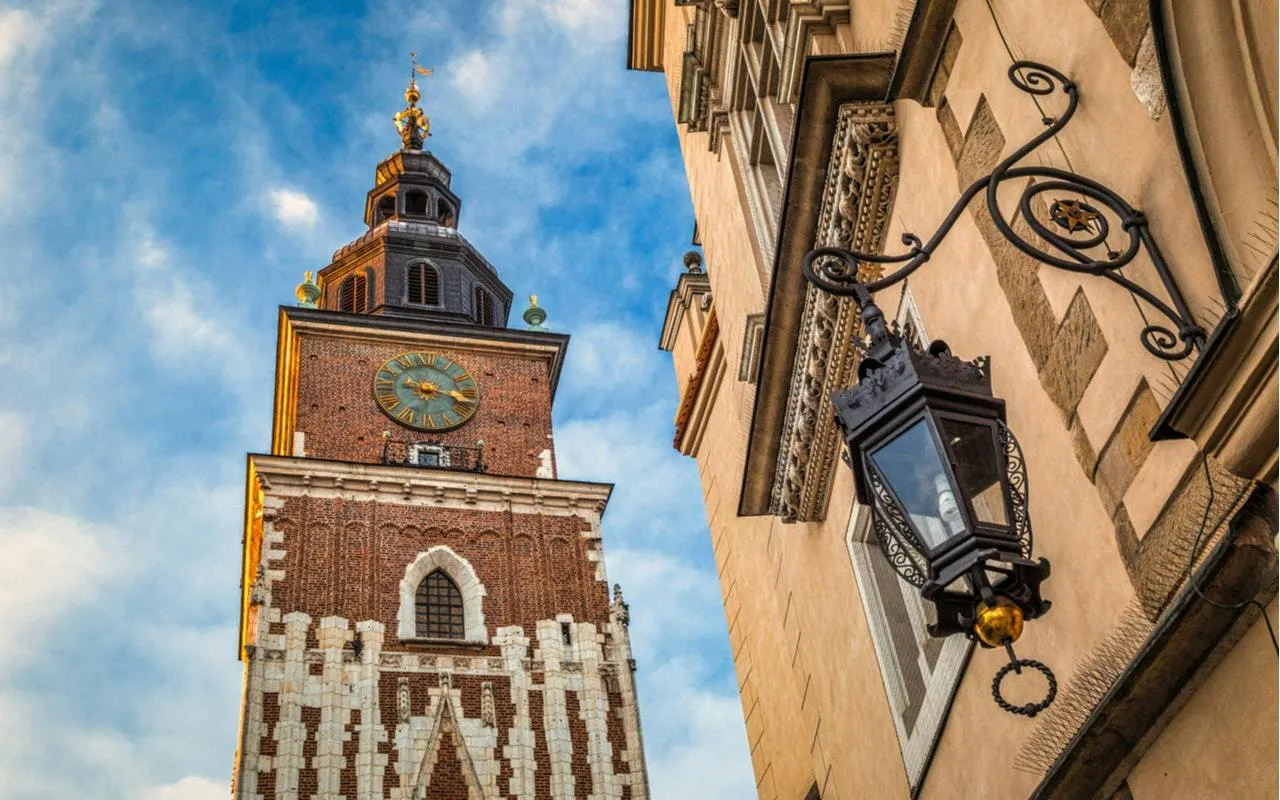 St. Mary's Basilica tower with clock in Krakow, part of Legends of Krakow self-guided tour.