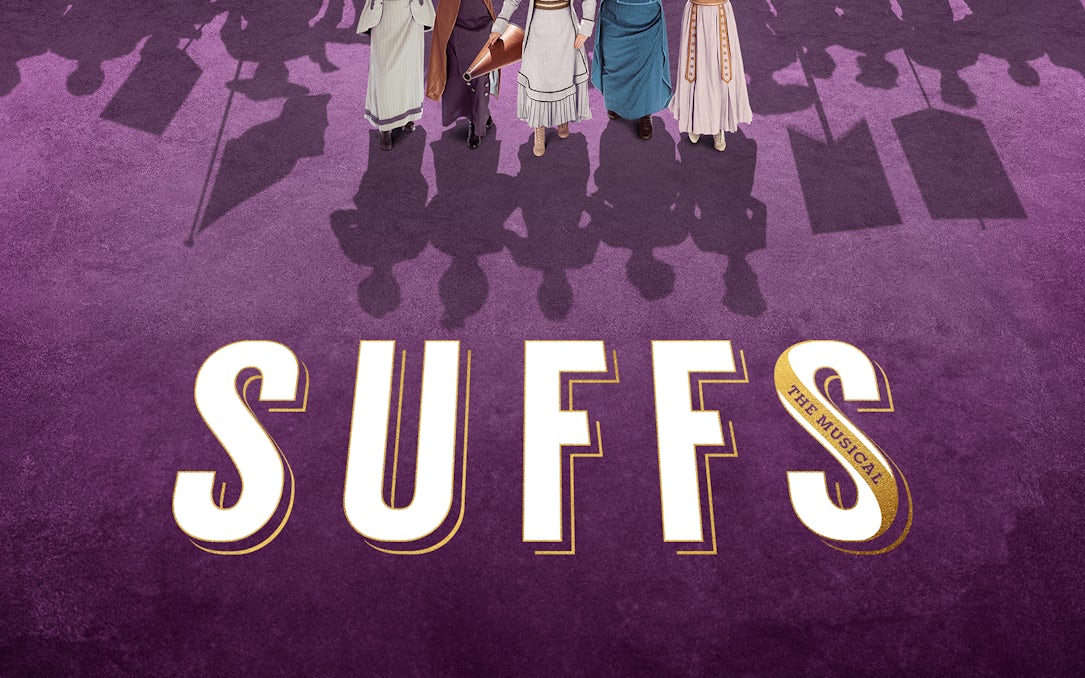 Women in period costumes with protest signs, Suffs musical promotion.