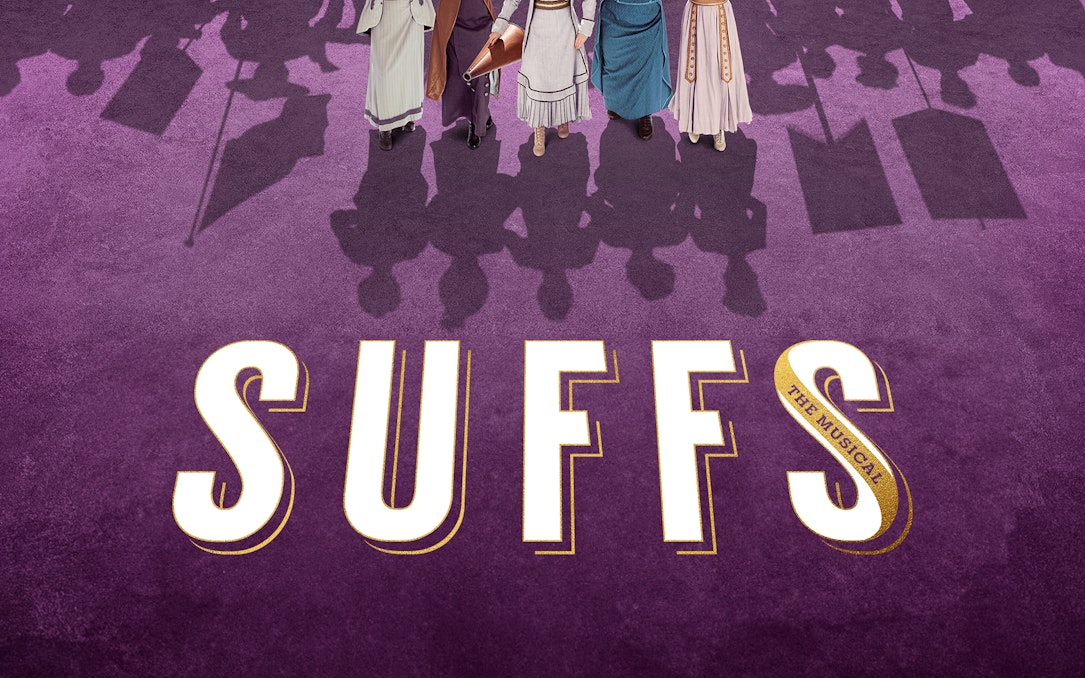 Women in period costumes with protest signs, Suffs musical promotion.