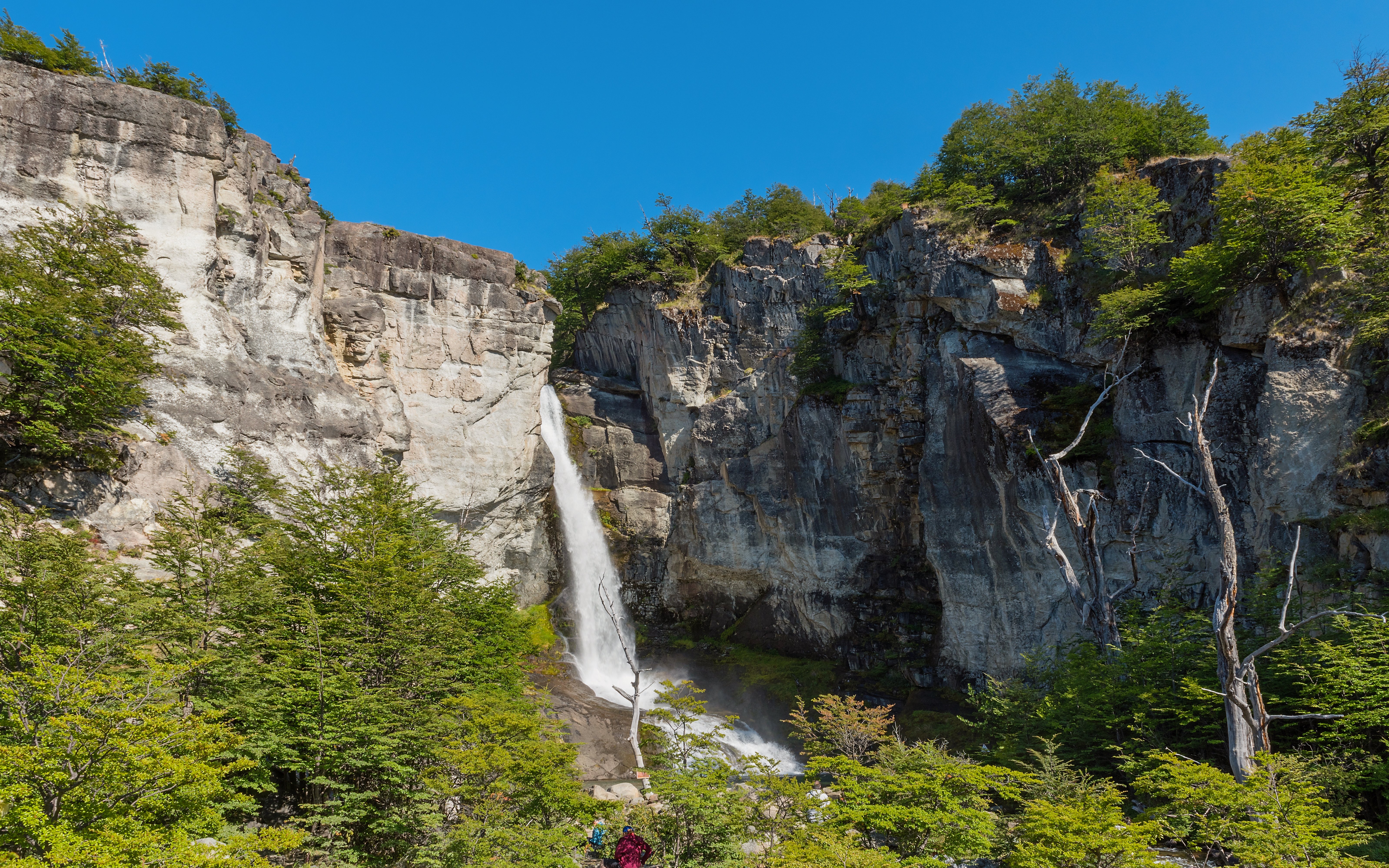 Waterfall cascading down rocky cliffs on Chorrillo del Salto Trail, El Chalten, Patagonia, Argentina.