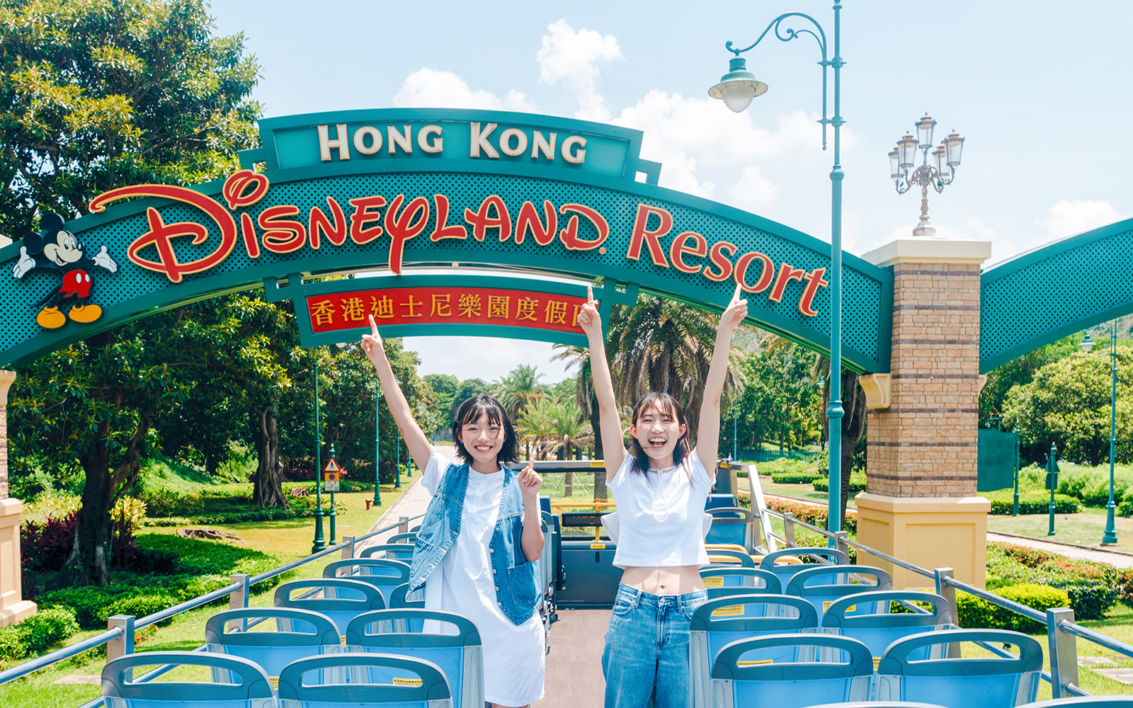 Tourists on a bus at Hong Kong Disneyland Resort entrance, Lantau Island.