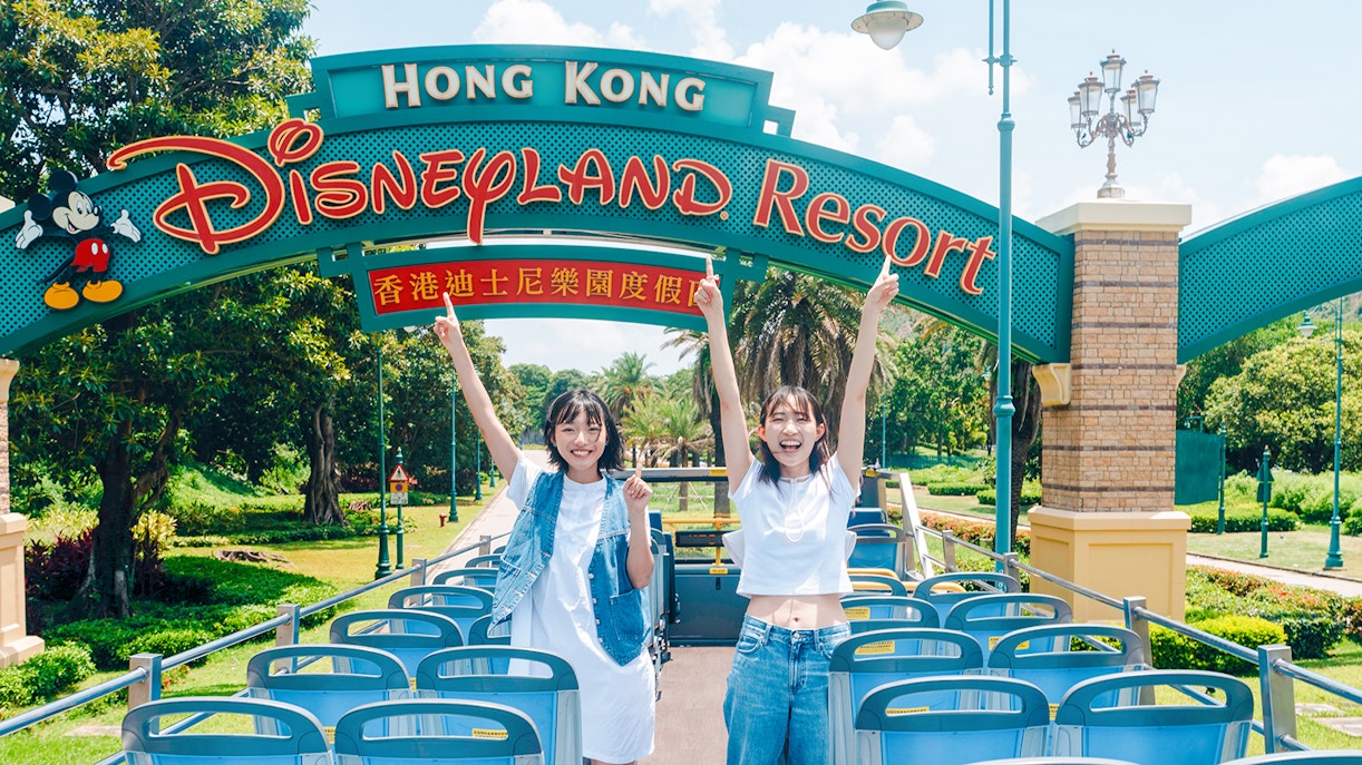 Tourists on a bus at Hong Kong Disneyland Resort entrance, Lantau Island.
