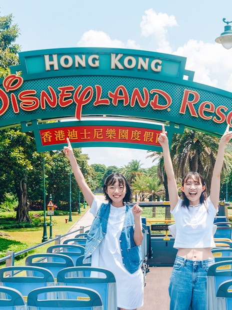 Tourists on a bus at Hong Kong Disneyland Resort entrance, Lantau Island.