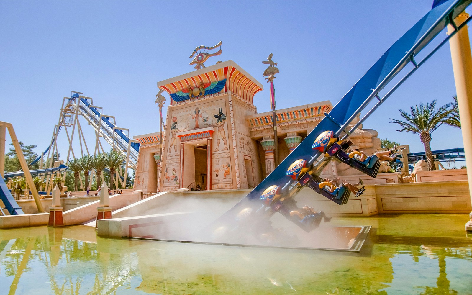 Visitors enjoying a roller coaster ride at Parc Asterix, France.