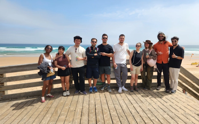 Group of tourists on a boardwalk at Phillip Island beach during Penguin Parade day trip.
