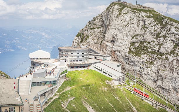 Mount Pilatus with cogwheel train and Lucerne lake view, Switzerland.
