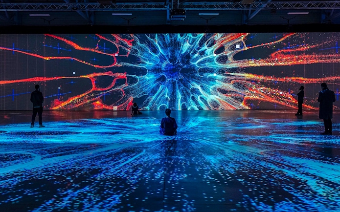 Guests viewing digital art projections at Signal Space Digital Art Gallery.