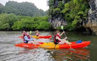 Kayakers paddling through mangroves at Ao Thalane, Krabi.