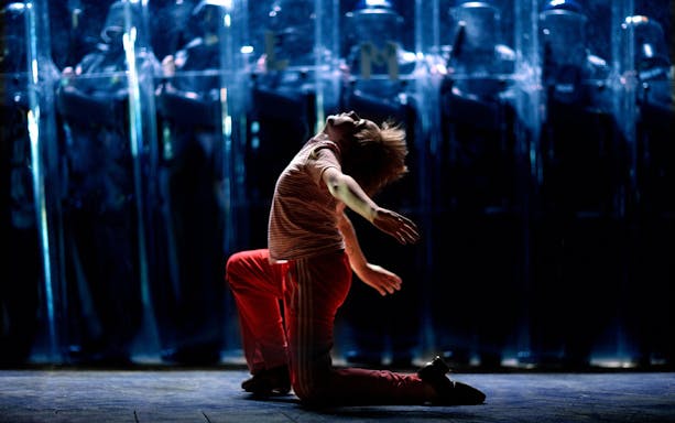 Performer dancing in Billy Elliot the Musical, West End stage.