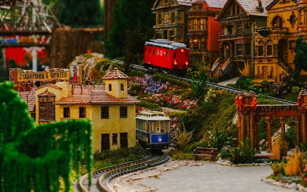 Miniature train and festive village display at Gardens by the Bay Christmas event.