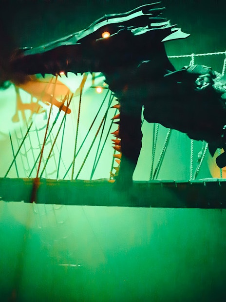 Dragon prop on stage at Pirates Dinner Adventure Show.