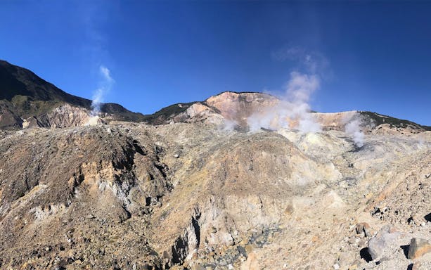 Dieng volcanic landscape with steaming vents, seen on a guided tour from Yogyakarta.
