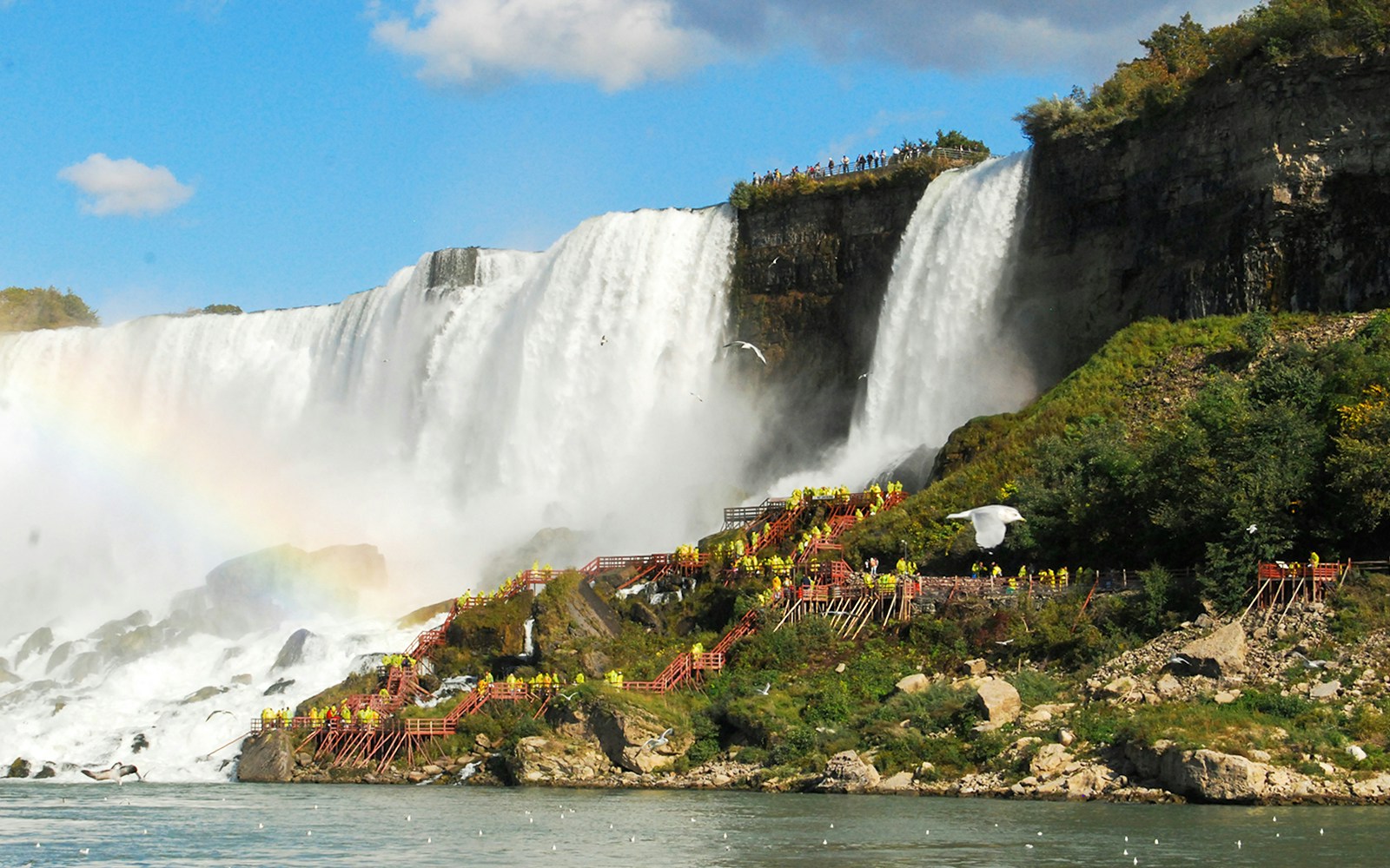 Visitors on walkways near Cave of the Winds at Niagara Falls, USA.