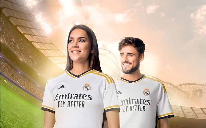 Real Madrid fans in team jerseys at a stadium, promoting World Tickets.