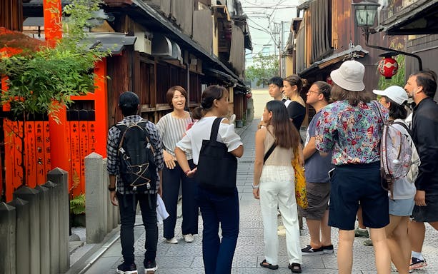 Guests exploring Kyoto's Geisha District with a guide.